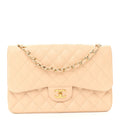 Chanel Caviar Quilted Jumbo Double Flap Beige