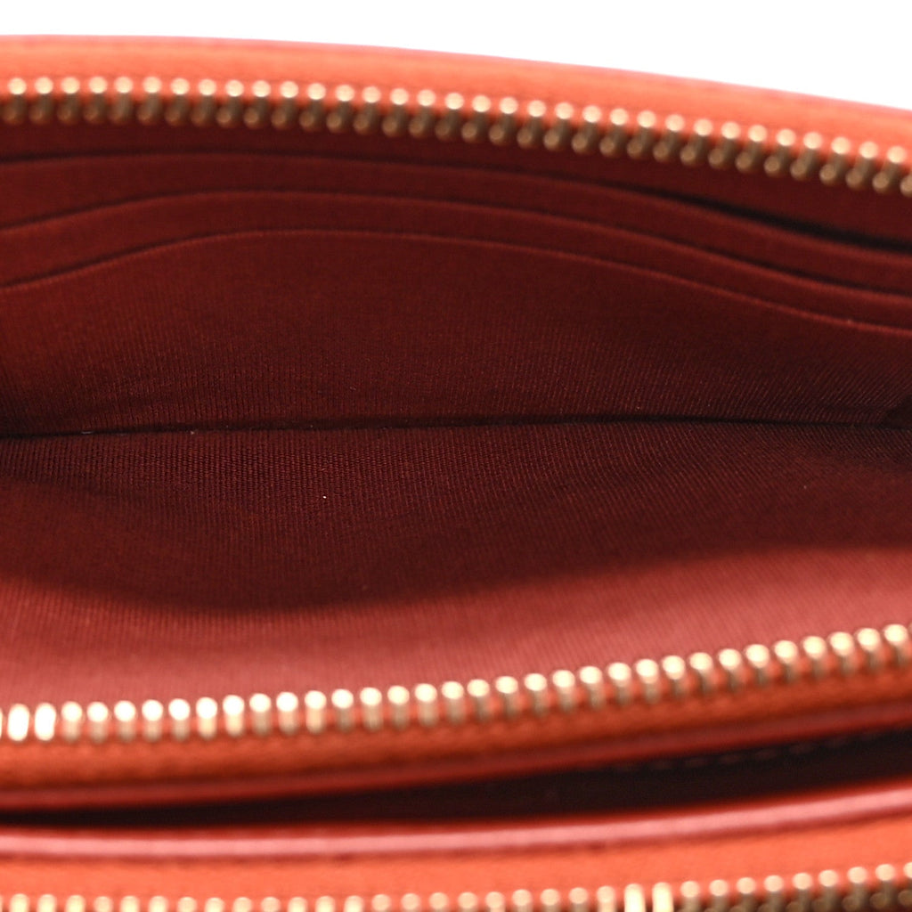 Chanel Lambskin Quilted Small Boy Clutch With Chain Orange