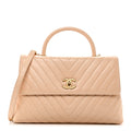Chanel Calfskin Chevron Quilted Medium Coco Handle Flap Beige