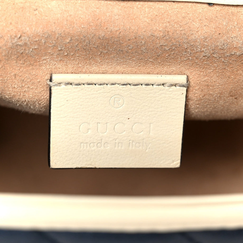 Gucci Vintage Effect Calfskin Matelasse Diagonal Mini Torchon GG Marmont Top Handle Shoulder Bag Blue Agata Mystic White