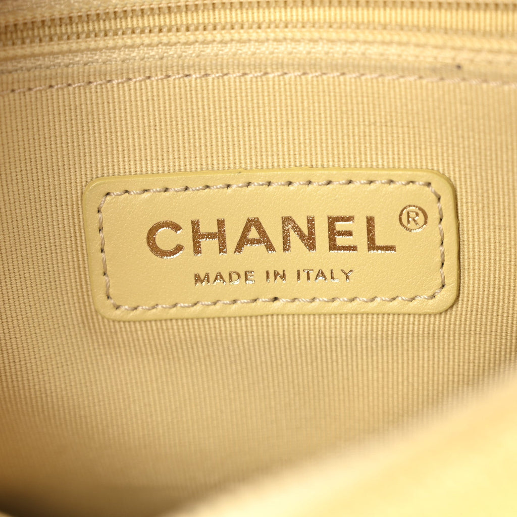 Chanel Shiny Caviar Quilted Chain Melody Backpack Yellow