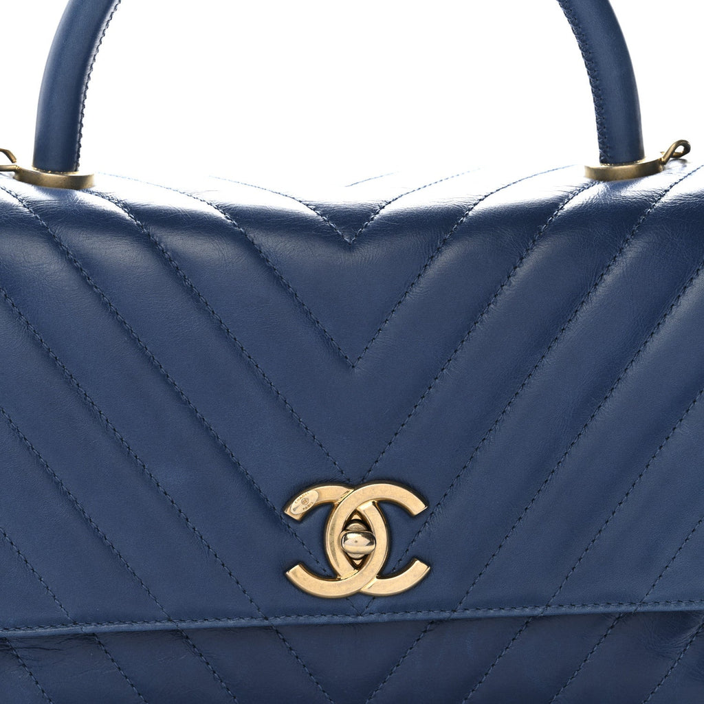 Chanel Aged Calfskin Chevron Quilted Small Coco Handle Flap Blue