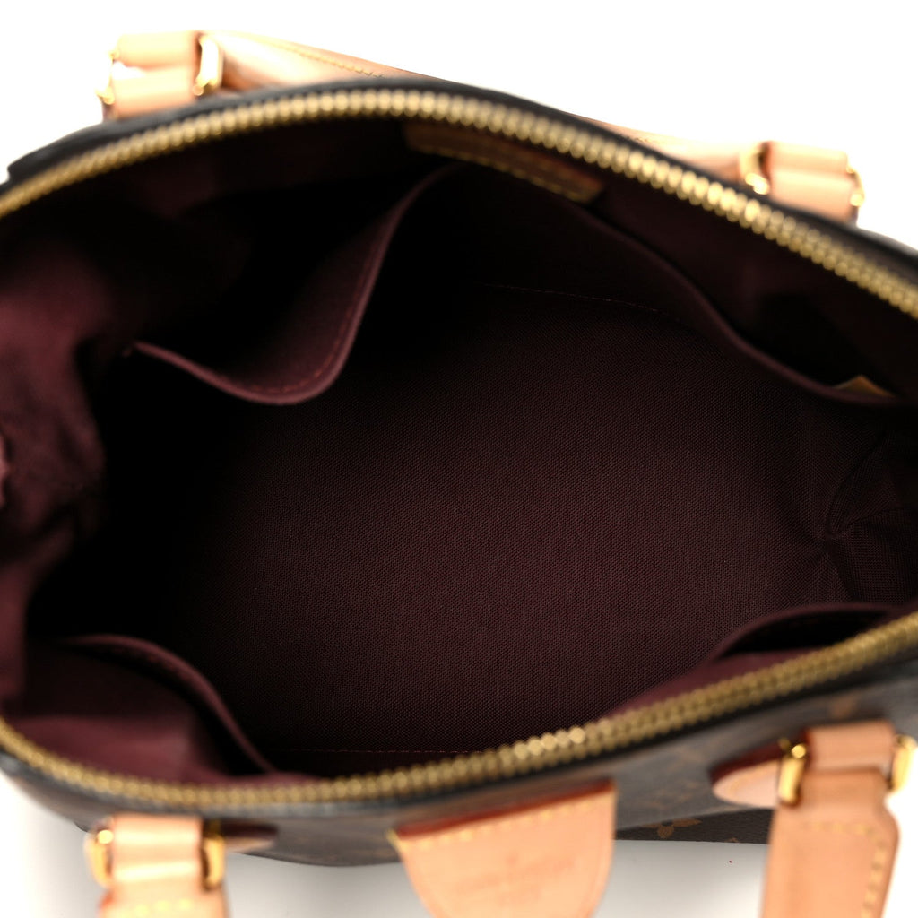 Louis Vuitton Monogram Rivoli PM