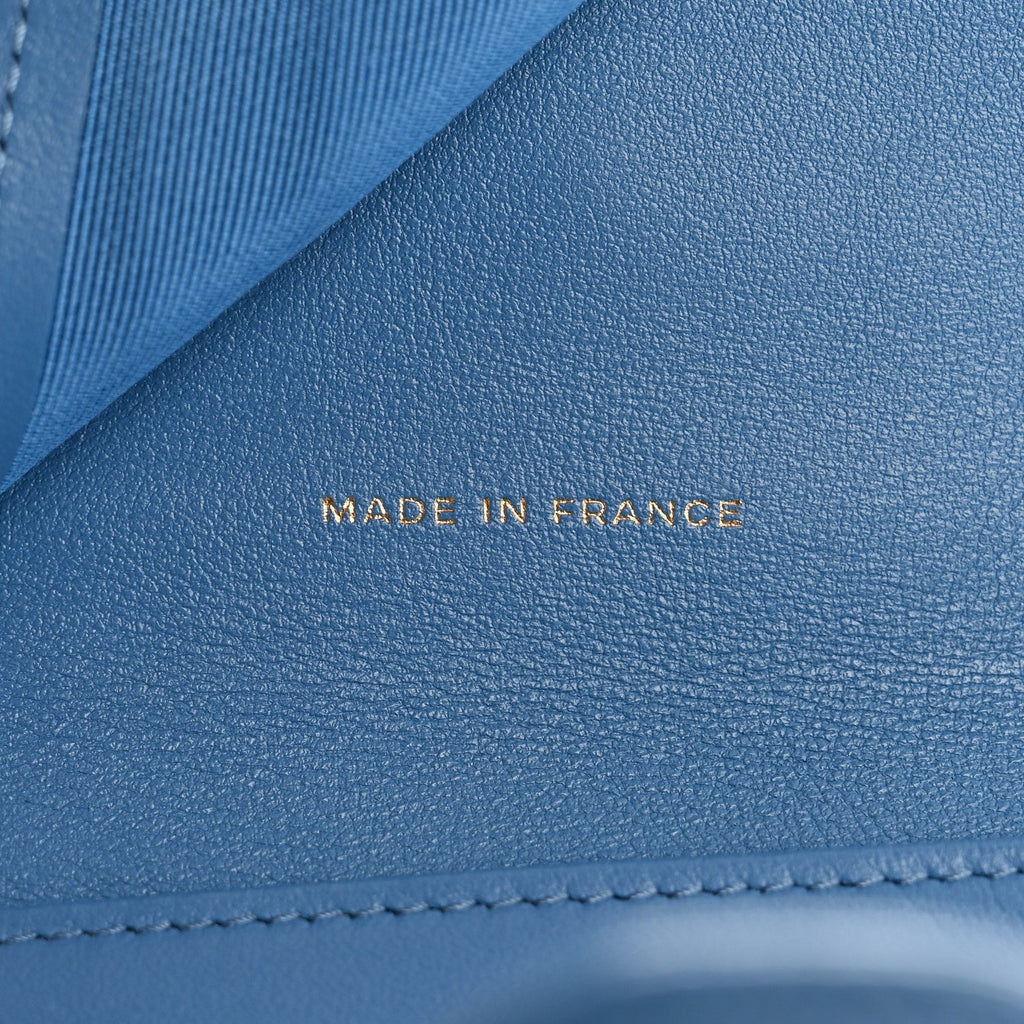Caviar Quilted Compact Flap Wallet Blue