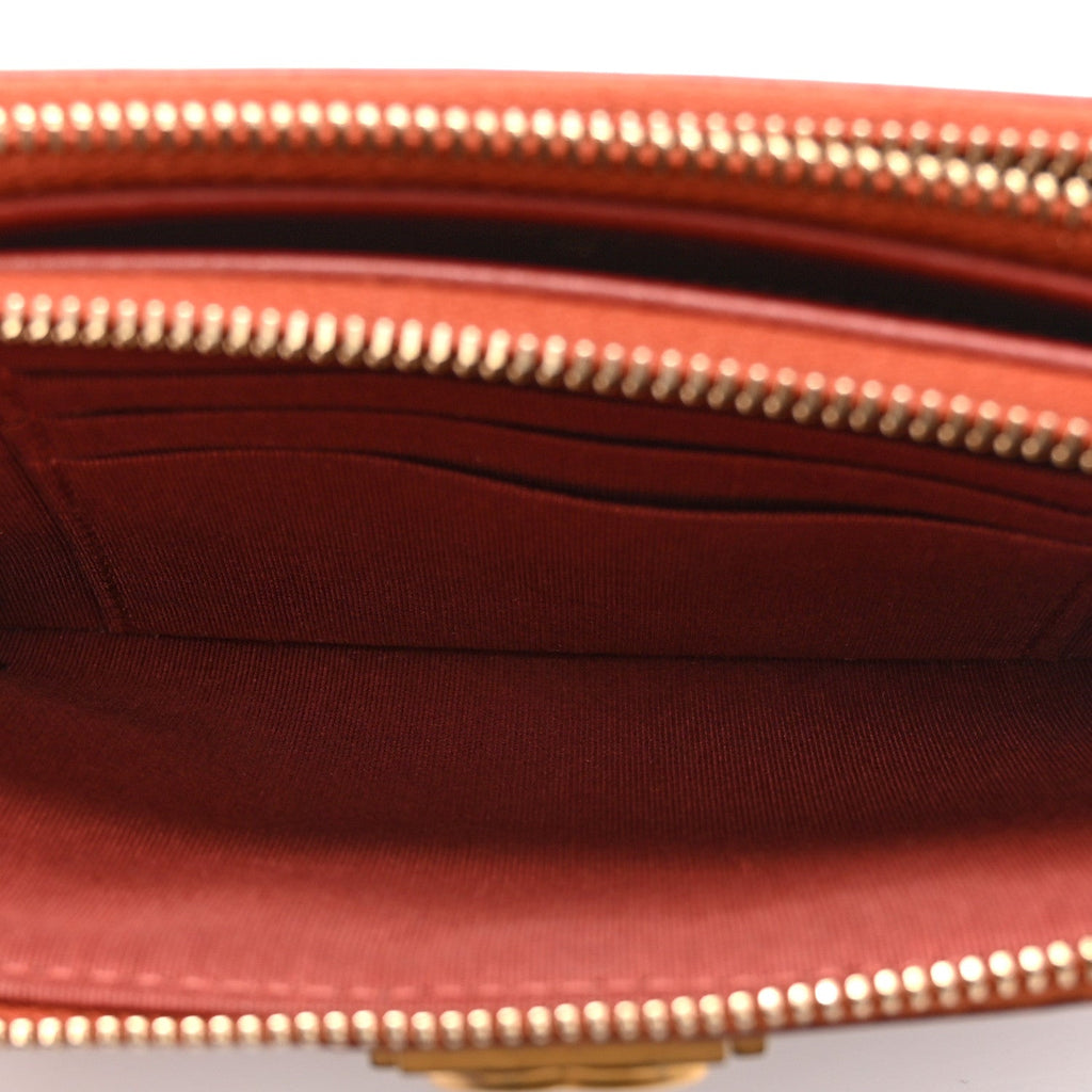 Chanel Lambskin Quilted Small Boy Clutch With Chain Orange