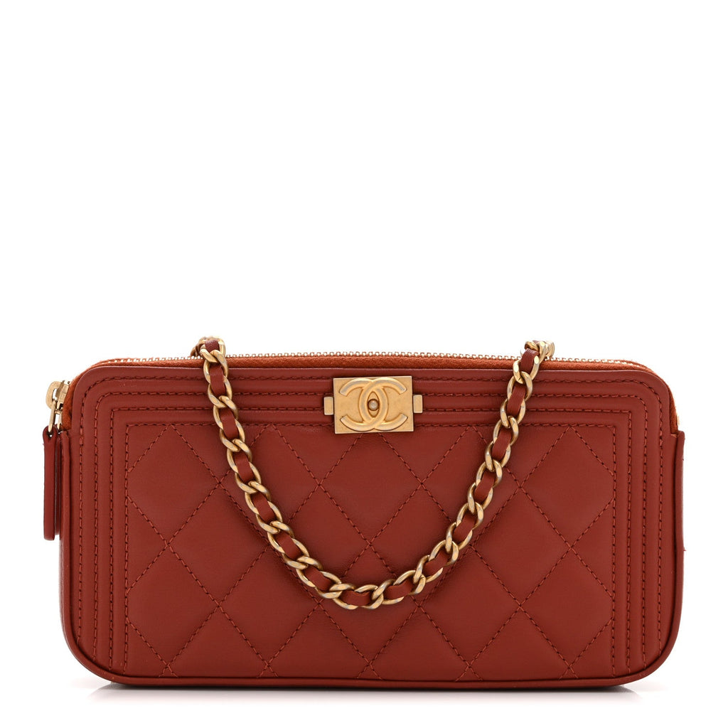 Chanel Lambskin Quilted Small Boy Clutch With Chain Orange
