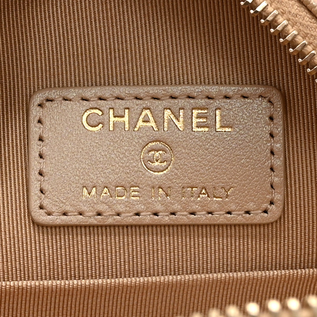 Chanel Iridescent Caviar Quilted Round Clutch With Chain Beige