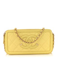 Chanel Caviar Quilted CC Filigree Clutch With Chain Yellow