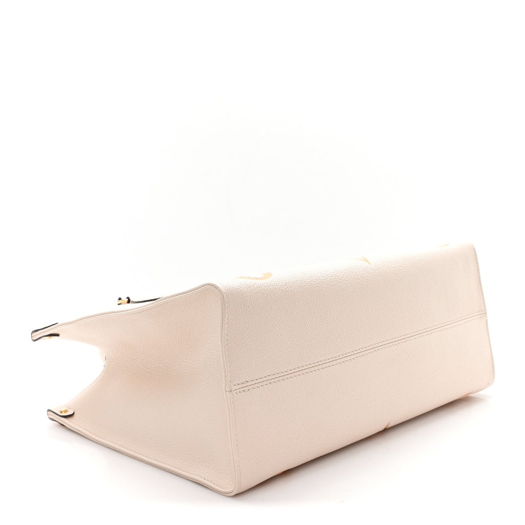 Louis Vuitton Empreinte Monogram Giant By The Pool Onthego MM Cream Saffron