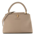Louis Vuitton Taurillon Capucines PM Galet