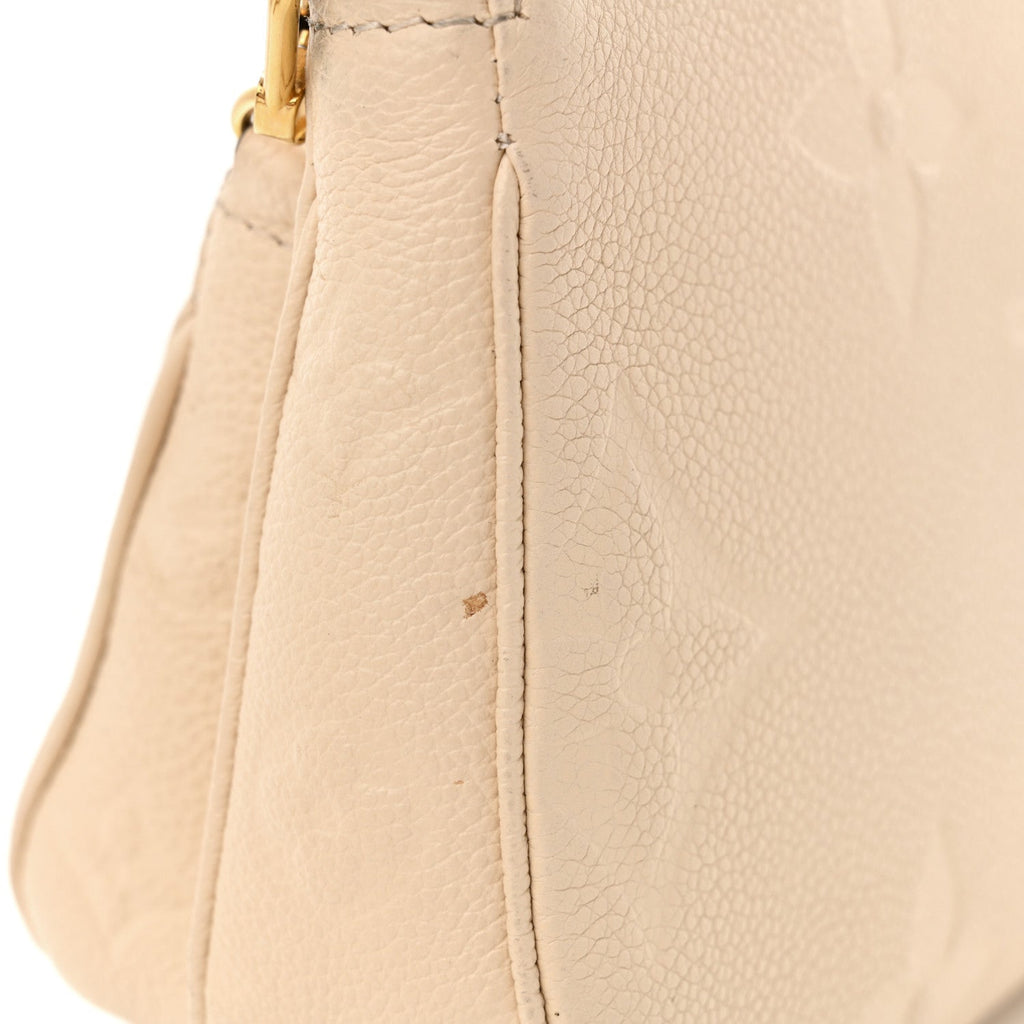 Louis Vuitton Empreinte Monogram Giant Multi Pochette Accessories Cream