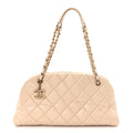 Chanel Aged Calfskin Quilted Medium Just Mademoiselle Bowling Bag Beige
