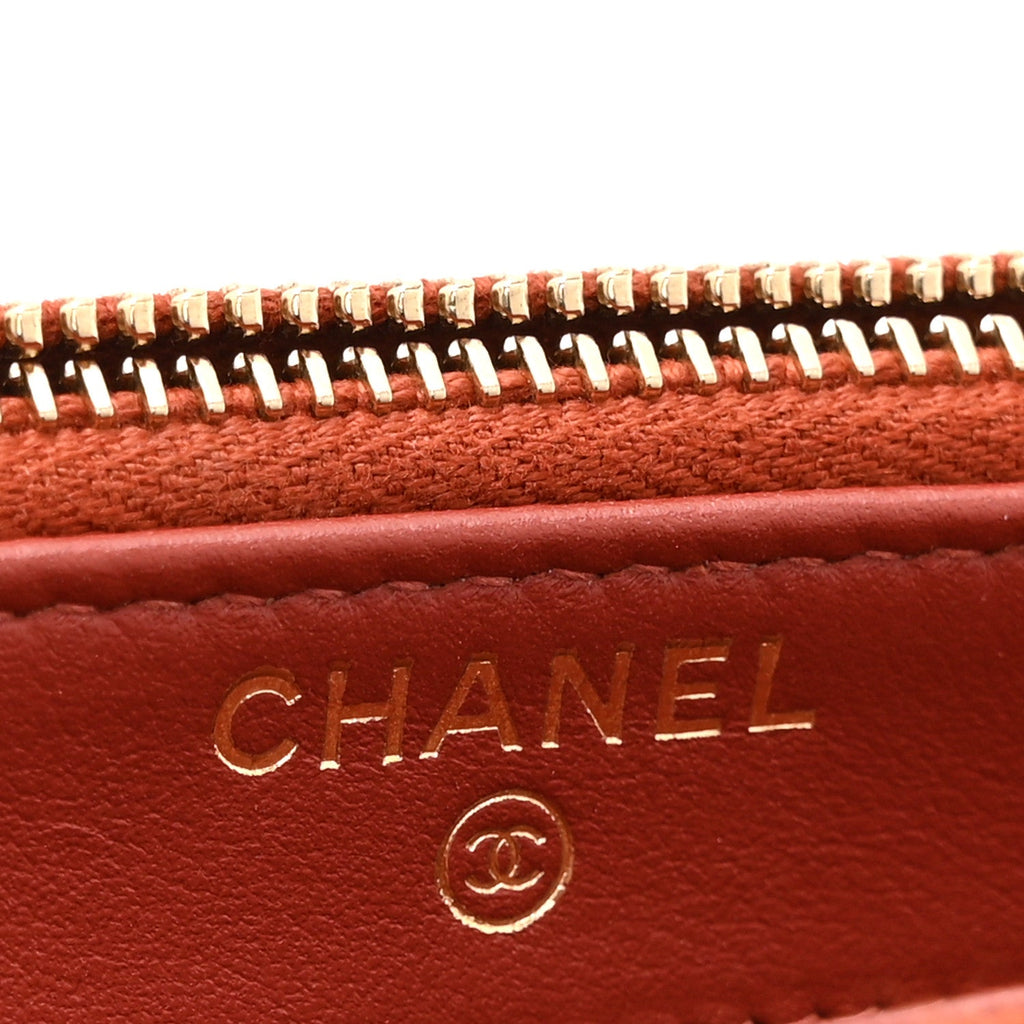 Chanel Lambskin Quilted Small Boy Clutch With Chain Orange