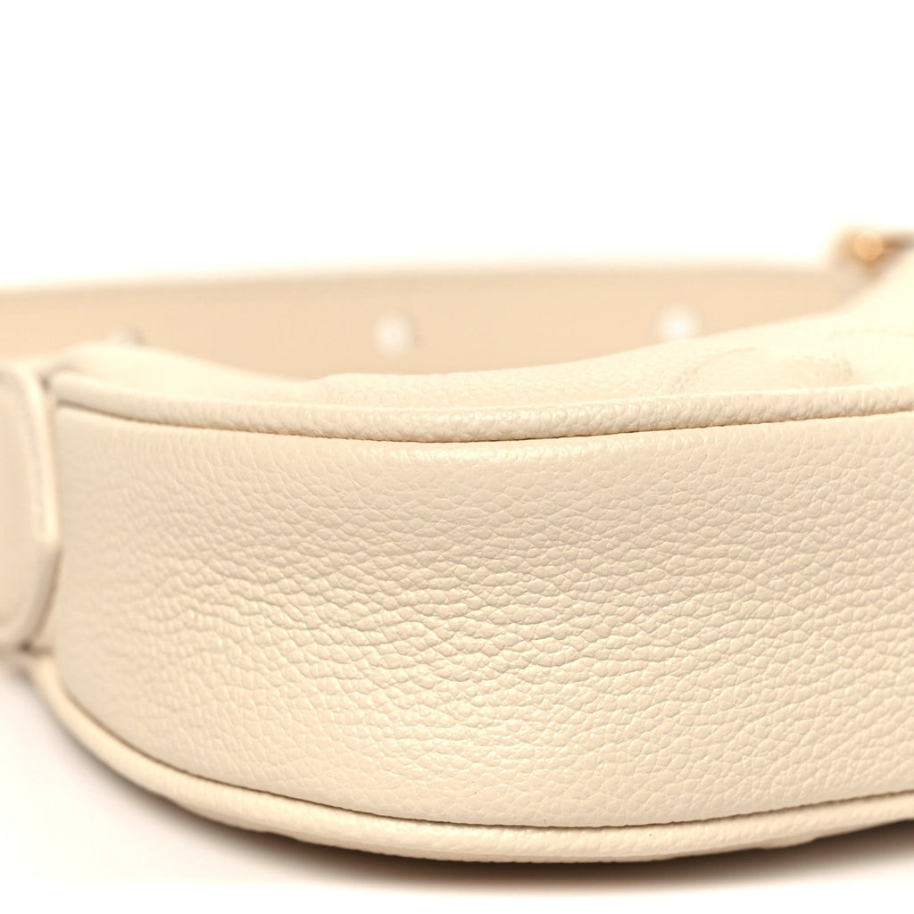 Louis Vuitton Empreinte Monogram Mini Moon Cream