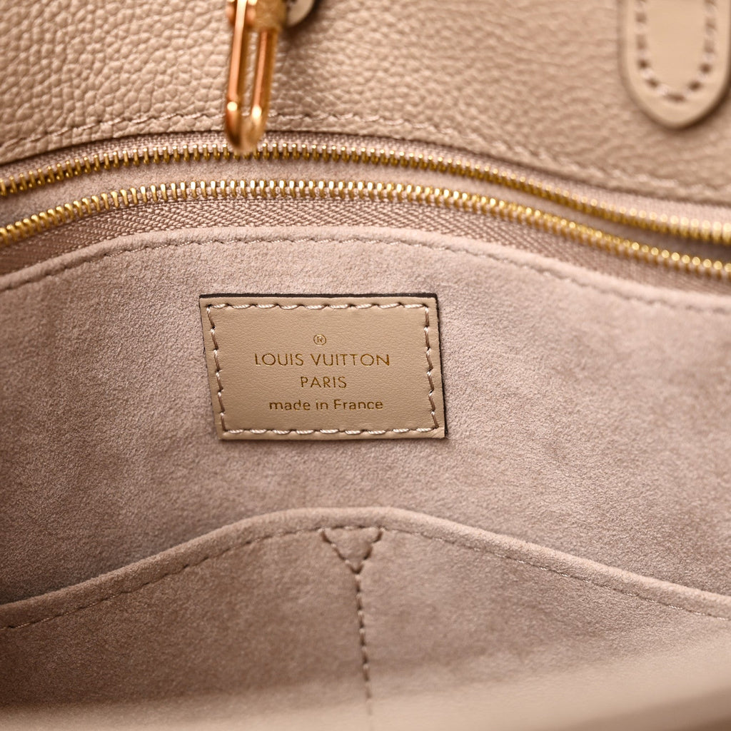 Louis Vuitton Empreinte Monogram Giant Onthego MM Tourterelle