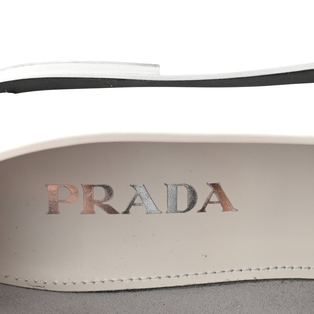 Prada Spazzolato Metal Triangle Logo 20mm Loafers 39 White