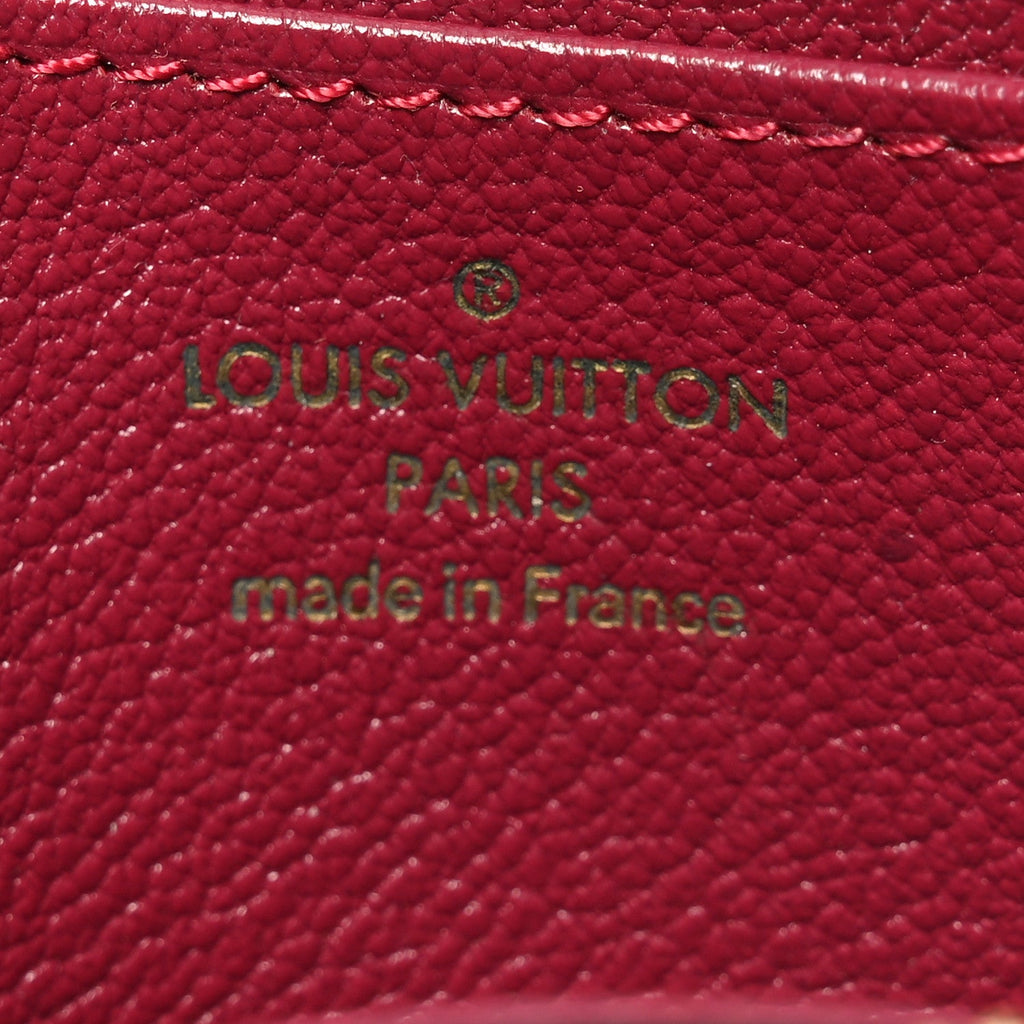 Louis Vuitton Ostrich Zippy Coin Purse Magenta