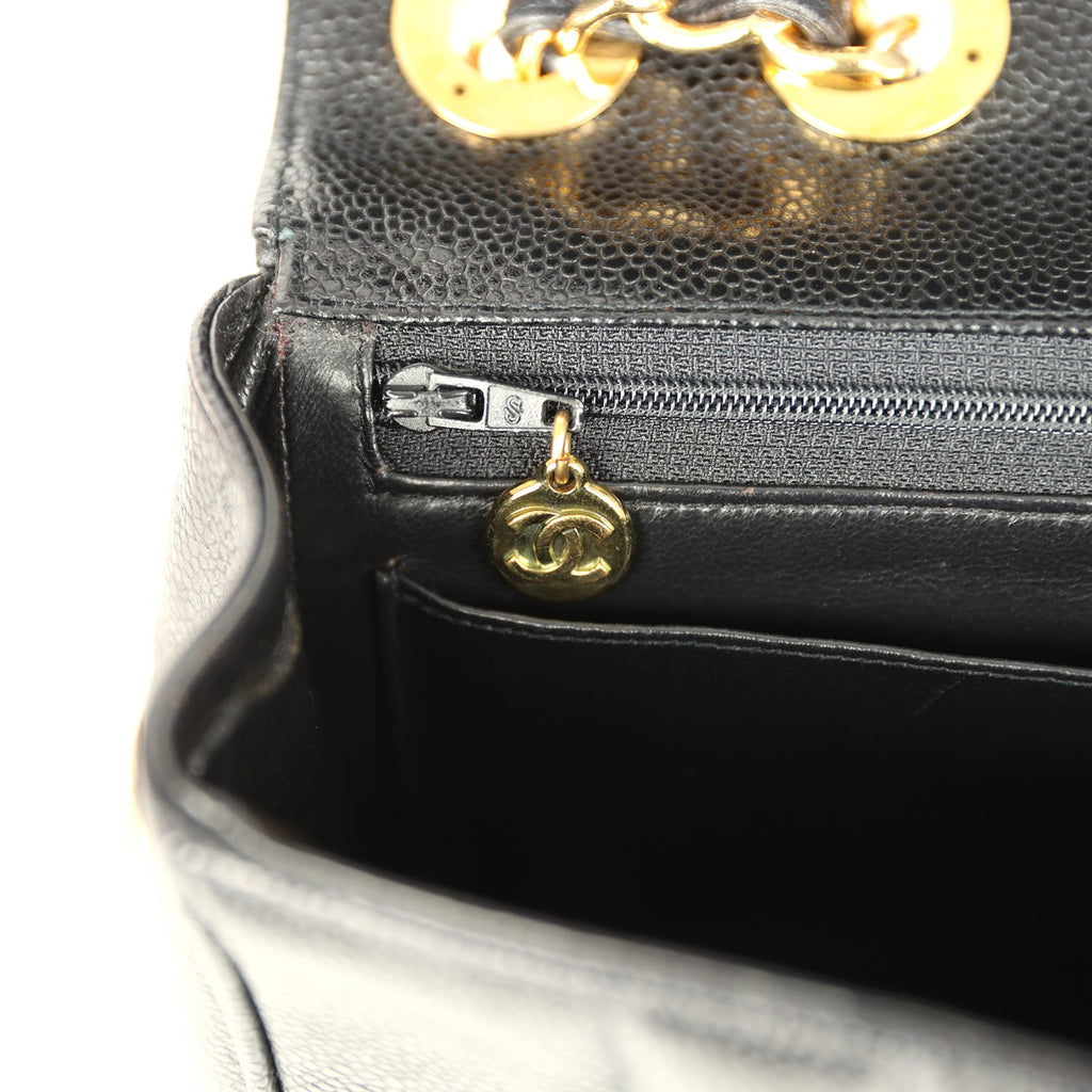 New Chanel Jumbo Classic Mademoiselle Vertical Flap Black Caviar Gold Hardware