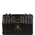 New Chanel Jumbo Classic Mademoiselle Vertical Flap Black Lambskin Gold Hardware