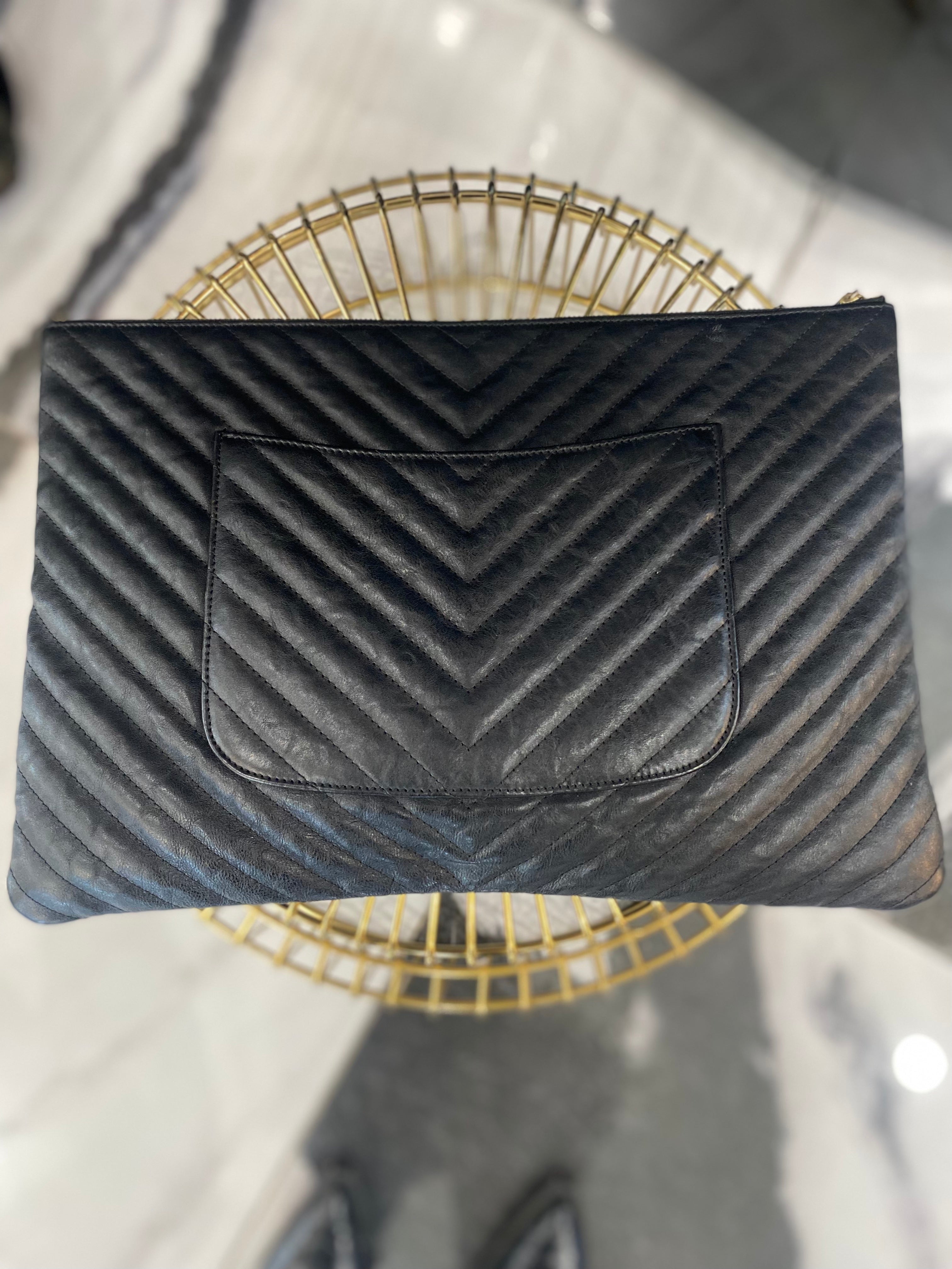 CHANEL CHEVRON QUILTED CALFSKIN O CLUTCH BAG