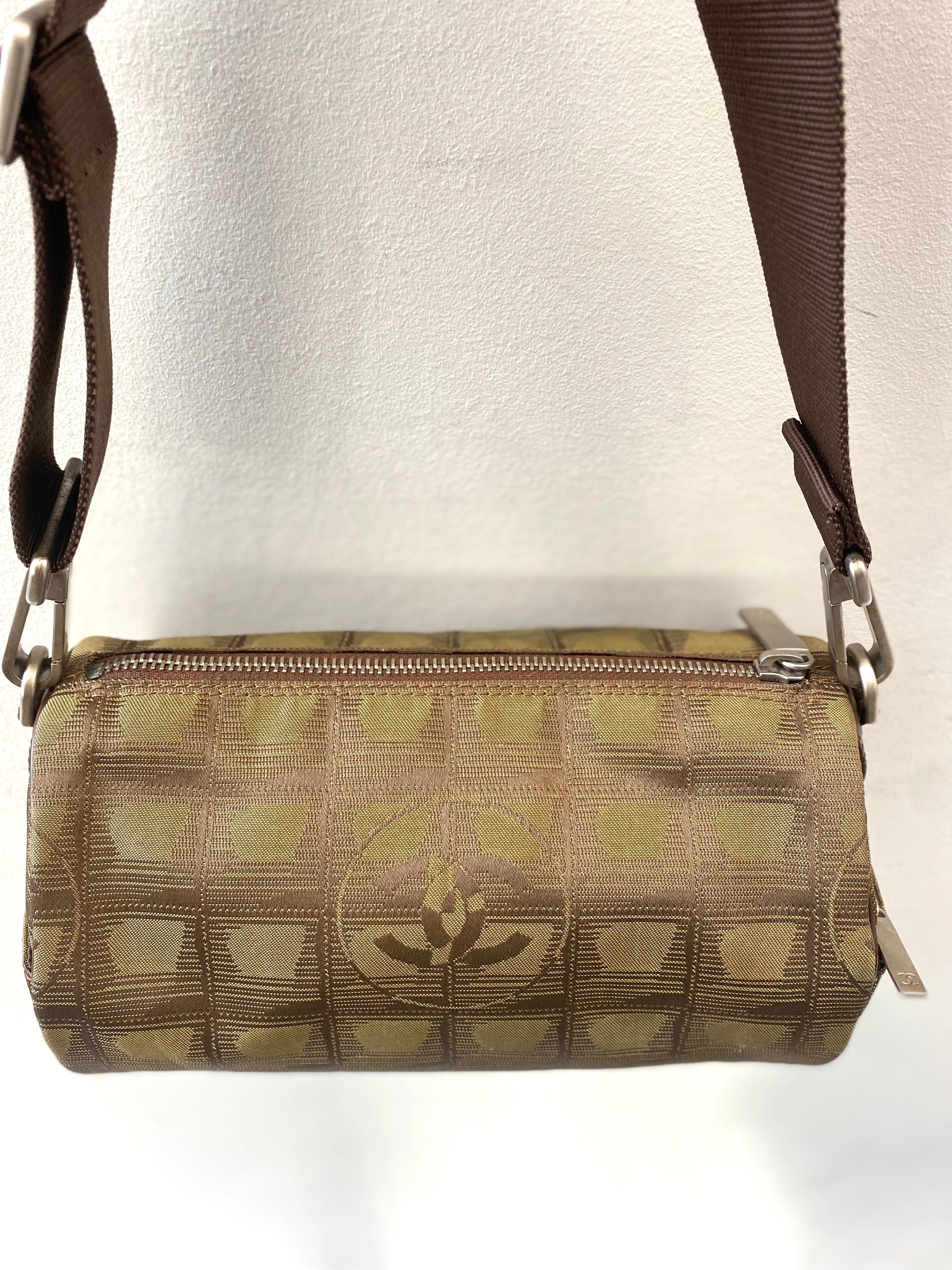 CHANEL TRAVEL LINE NYLON JACQUARD LEATHER MINI ROLL BAG