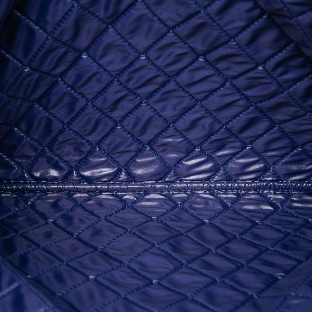 Chanel CC Bi Quilted Lambskin O Case Clutch