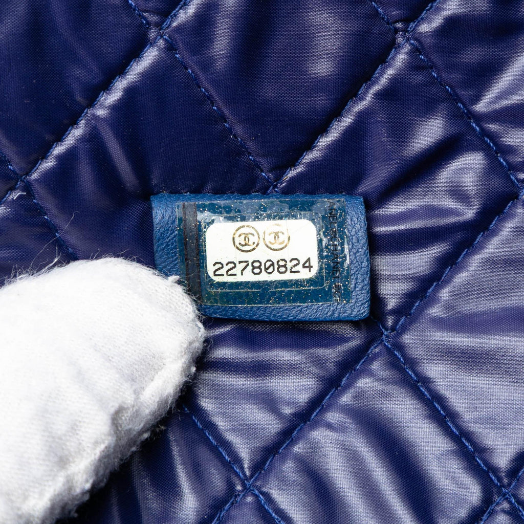 Chanel CC Bi Quilted Lambskin O Case Clutch