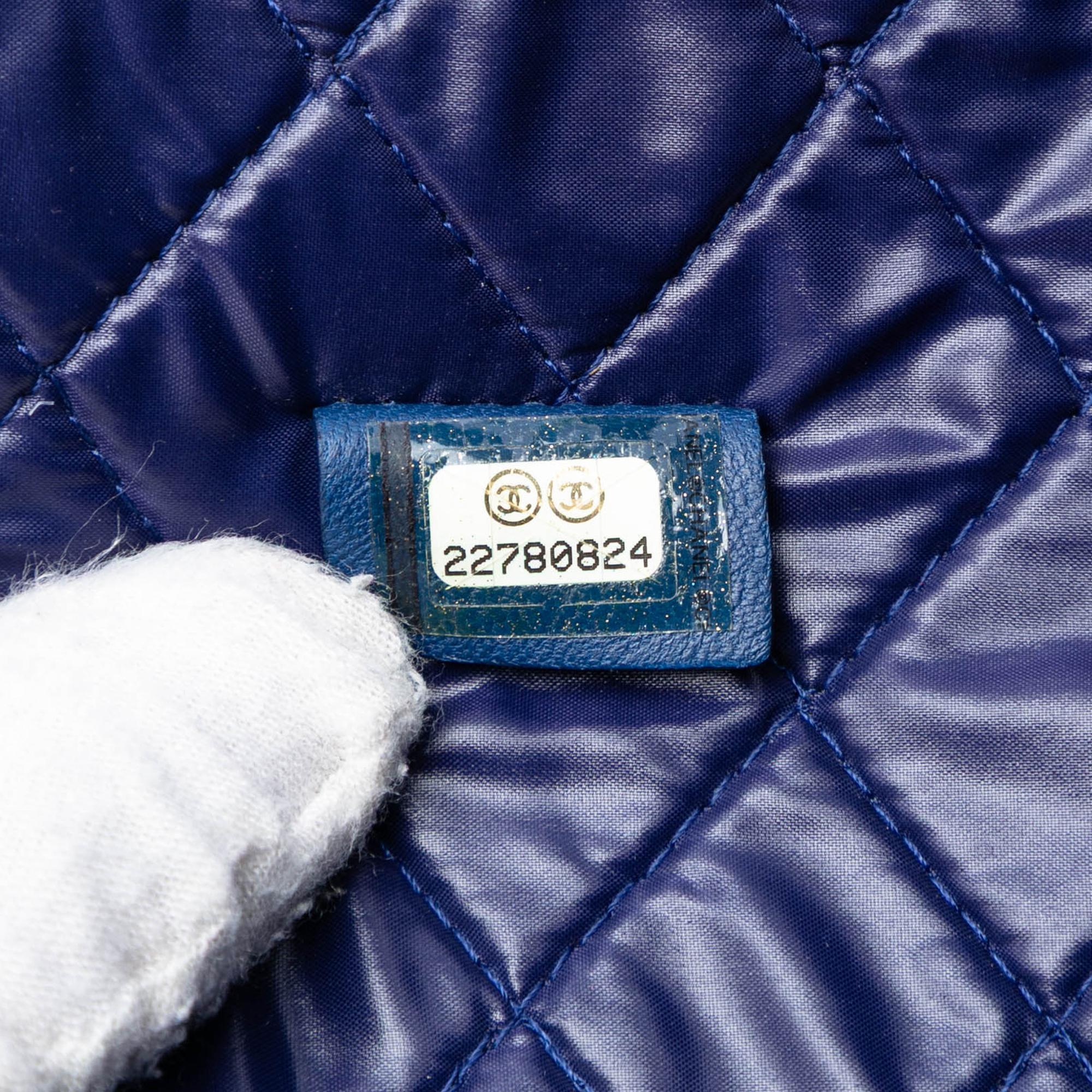 Chanel CC Bi Quilted Lambskin O Case Clutch