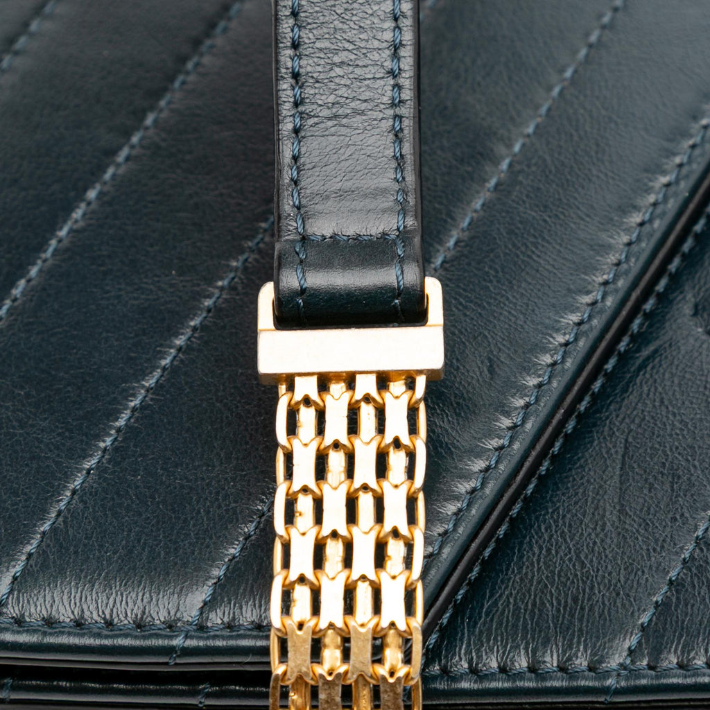 Chanel CC Chevron Calfskin Medal Flap
