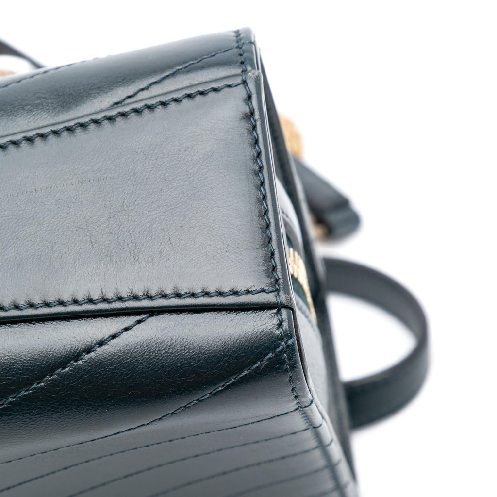 Chanel CC Chevron Calfskin Medal Flap