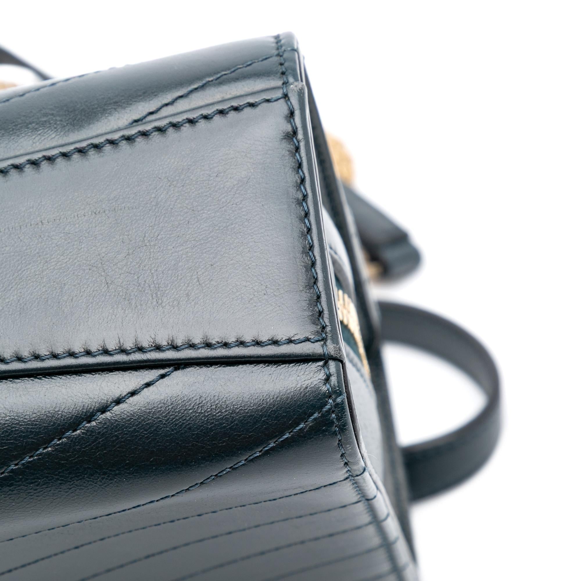 Chanel CC Chevron Calfskin Medal Flap