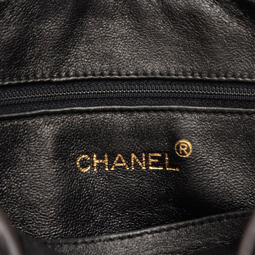 Chanel CC Diagonal Quilted Lambskin Tassel Camera Bag