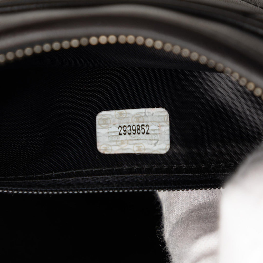 Chanel CC Diagonal Quilted Lambskin Tassel Camera Bag