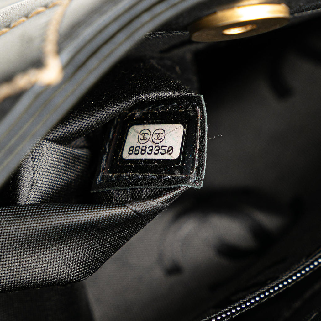 Chanel CC Lambskin Wild Stitch Handbag (SHG-aqtoNm)