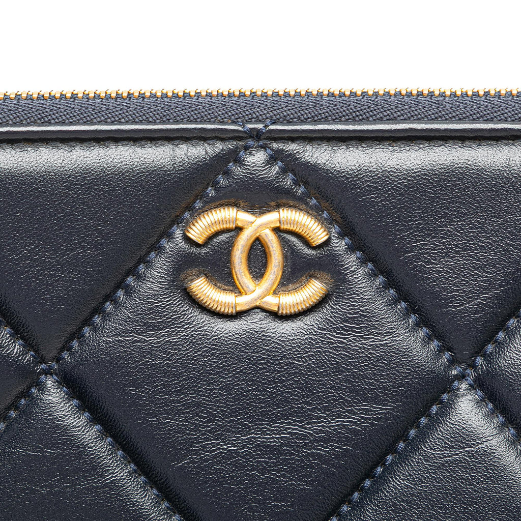 Chanel CC Large Quilted Lambskin O Case Clutch