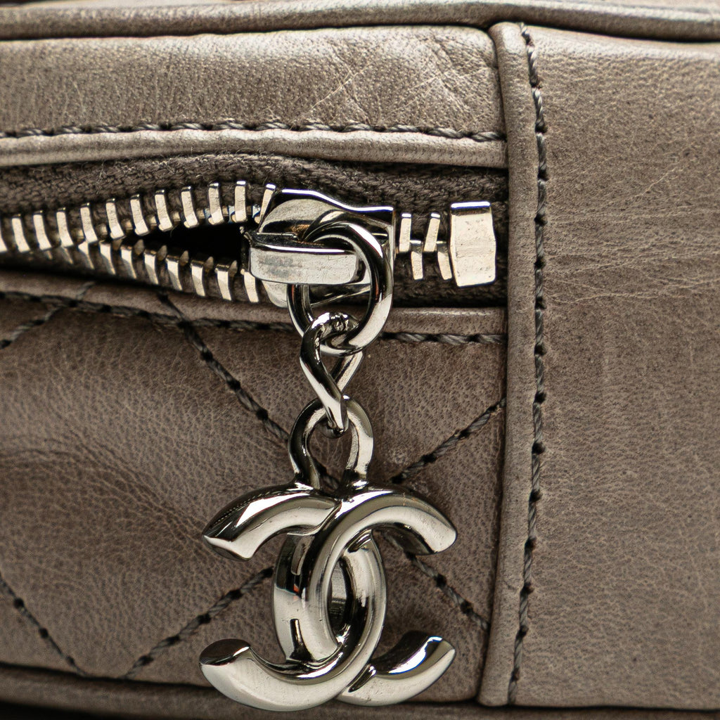 Chanel CC Quilted Aged Calfskin Round Clutch