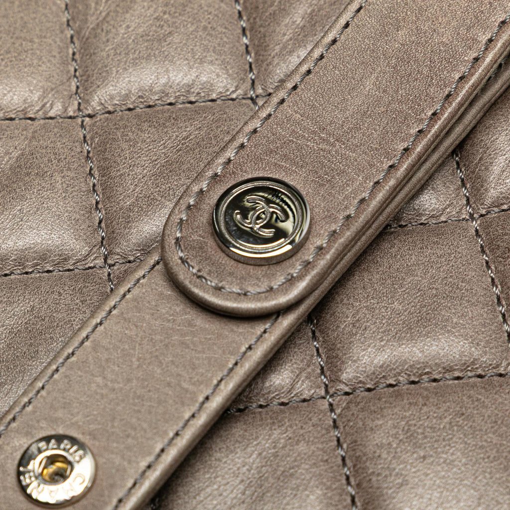 Chanel CC Quilted Aged Calfskin Round Clutch