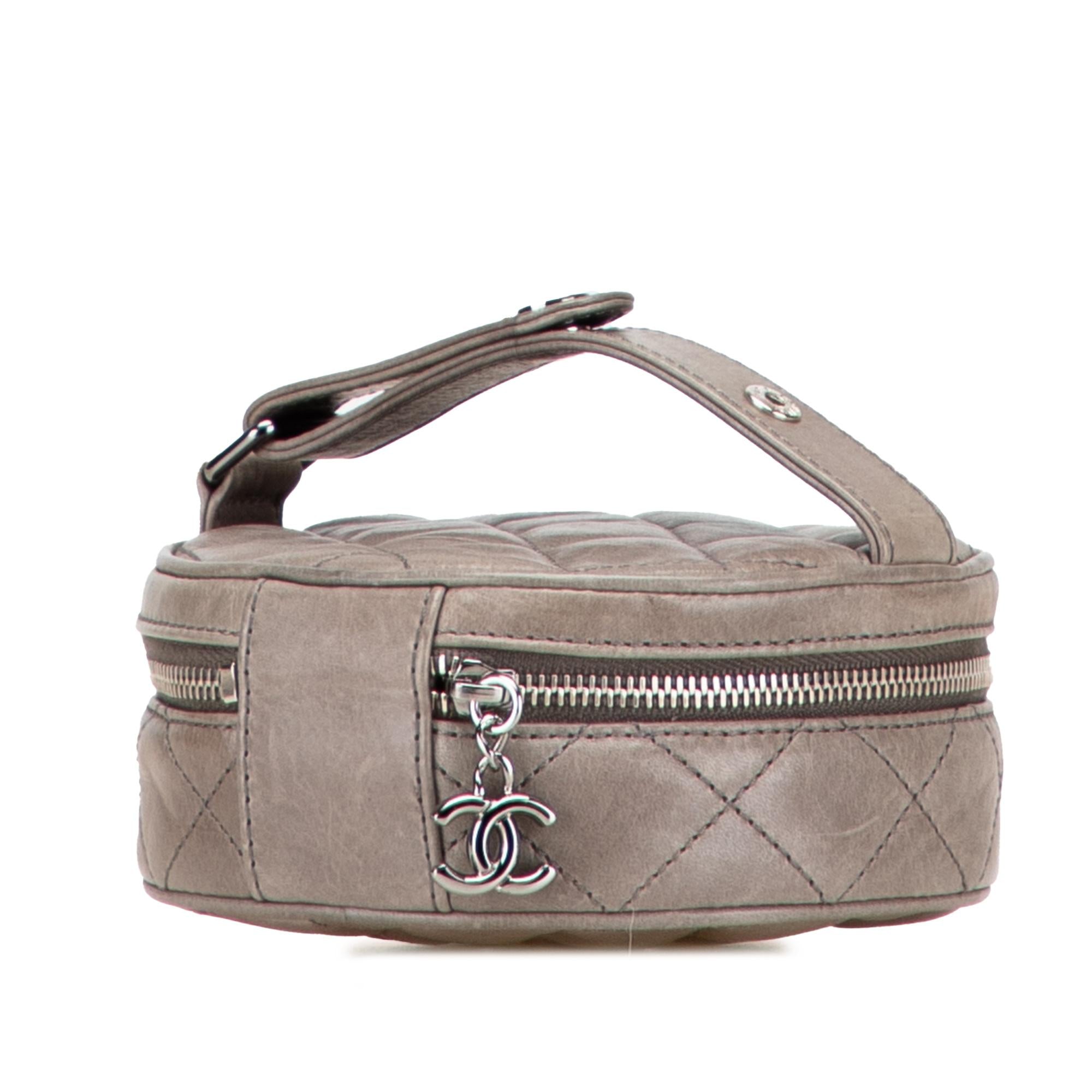 Chanel CC Quilted Aged Calfskin Round Clutch