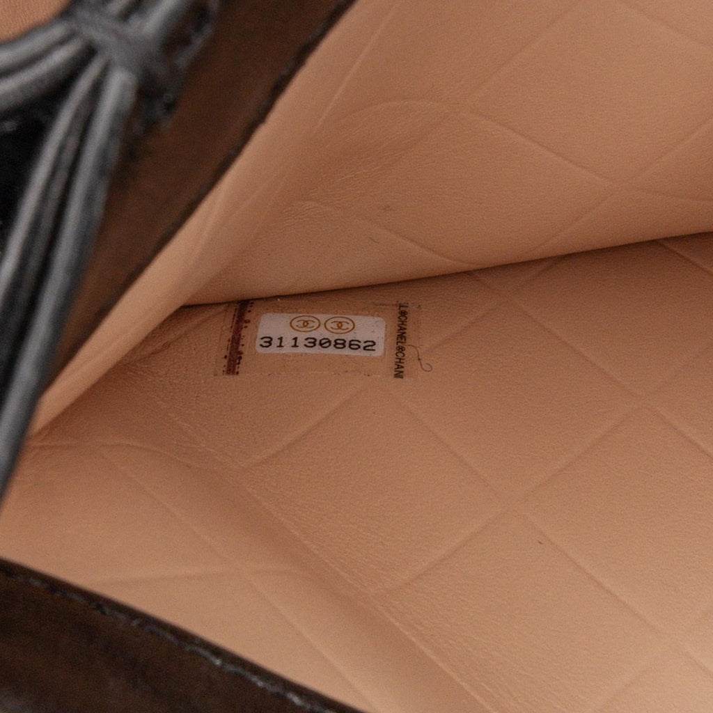 Chanel CC Quilted Calfskin Round Moon Messenger Flap