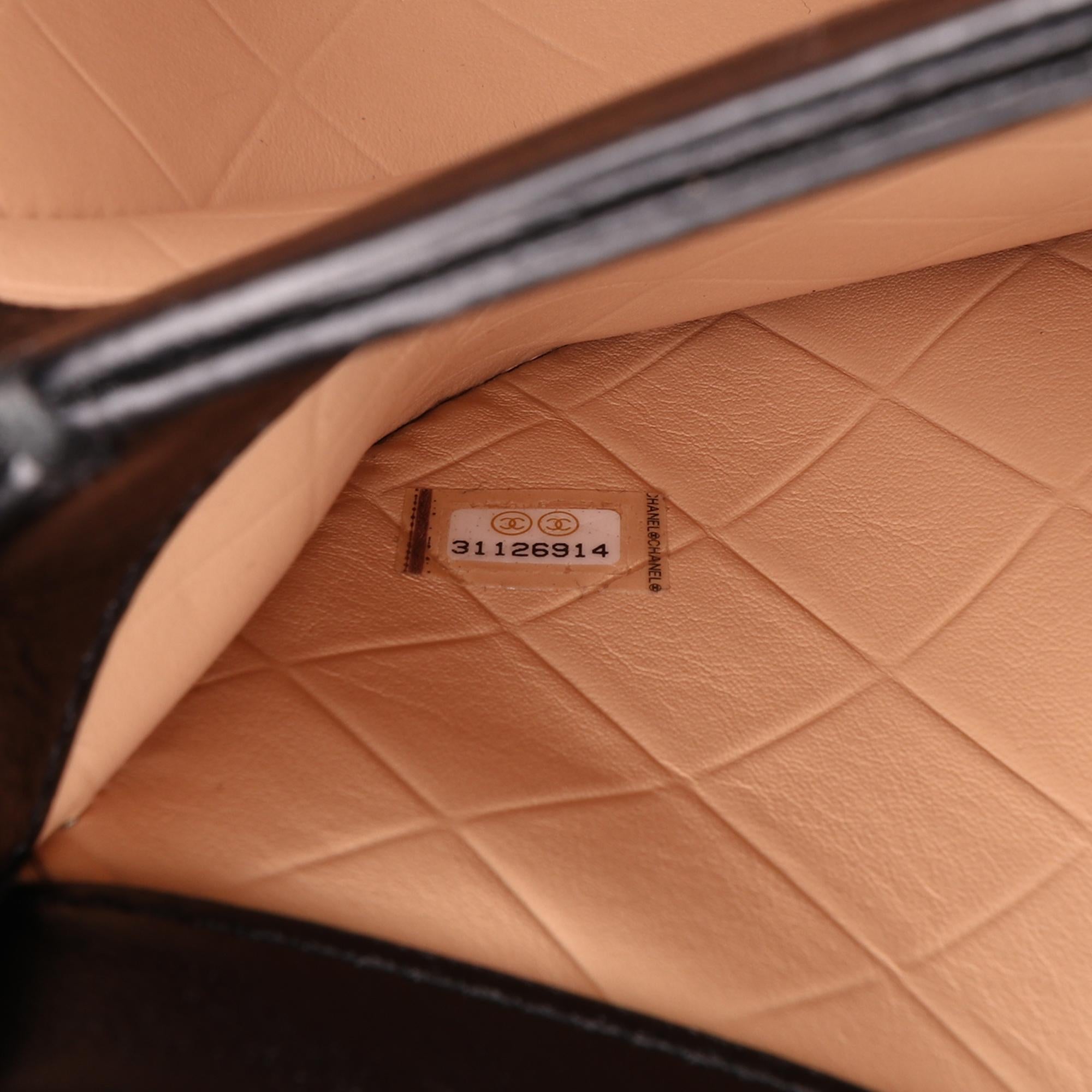 Chanel CC Quilted Calfskin Round Moon Messenger Flap