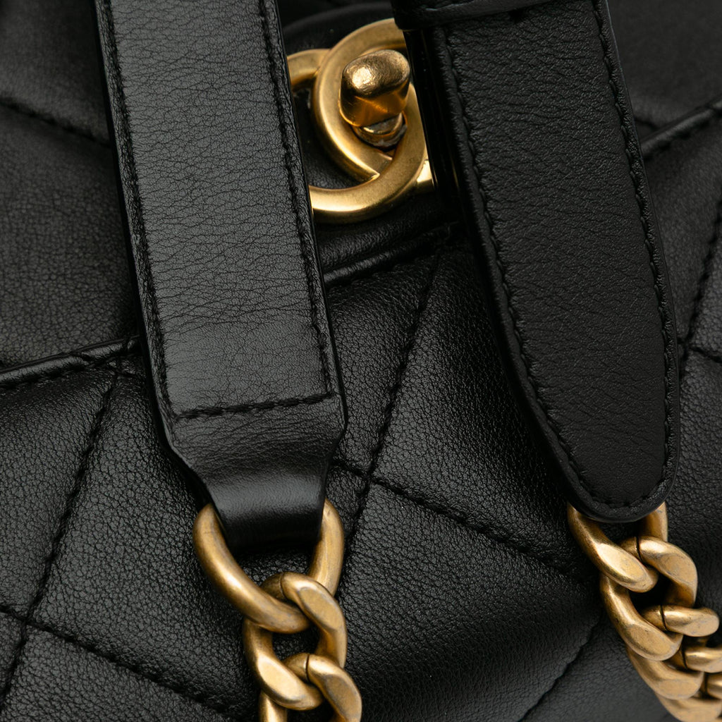 Chanel CC Quilted Calfskin Round Moon Messenger Flap