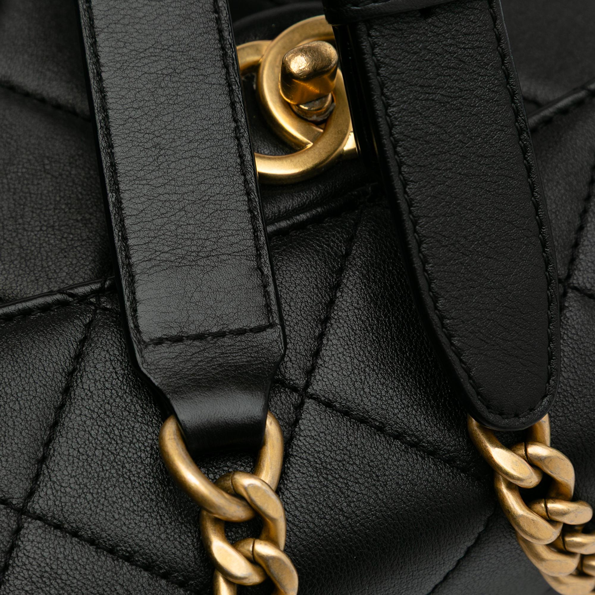 Chanel CC Quilted Calfskin Round Moon Messenger Flap
