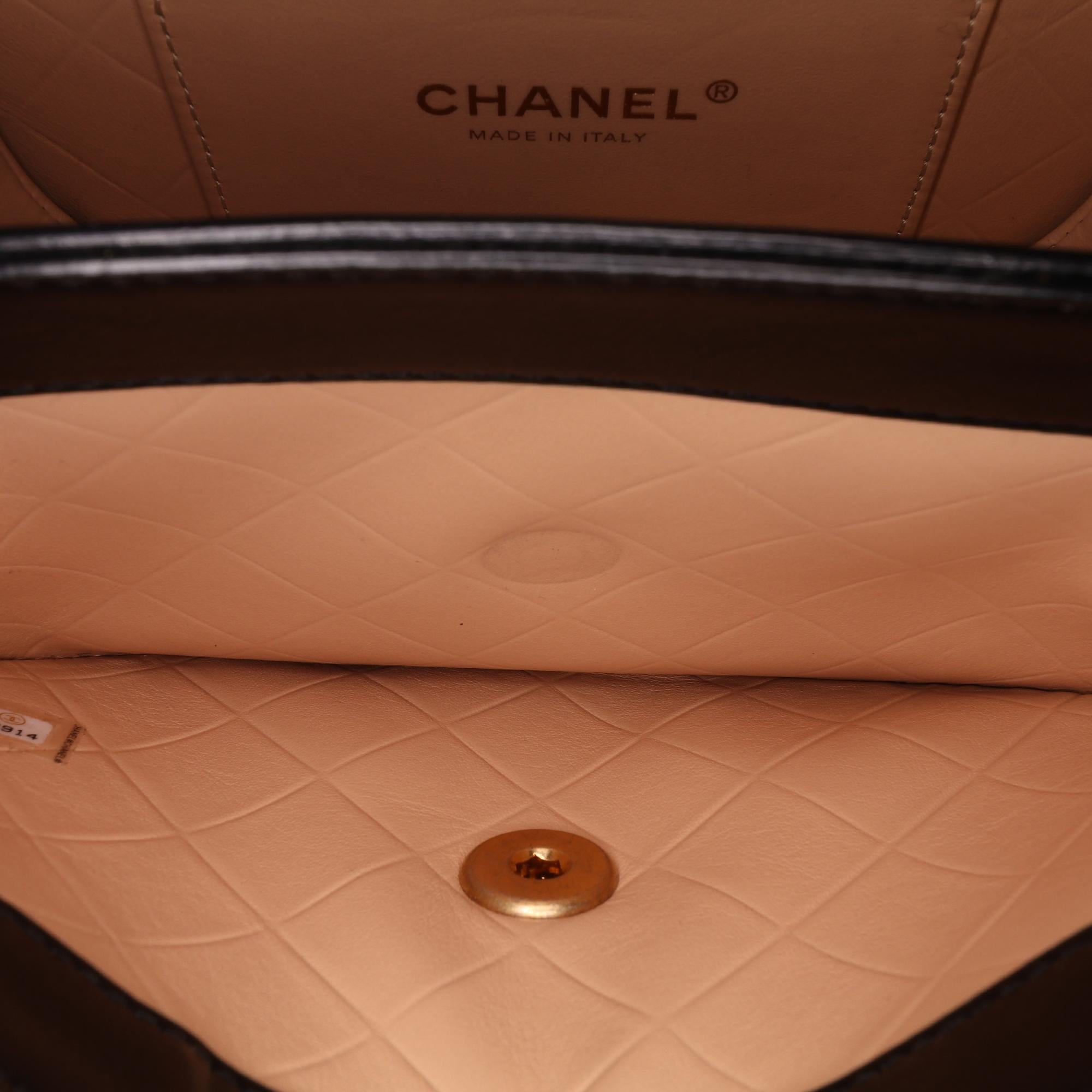 Chanel CC Quilted Calfskin Round Moon Messenger Flap