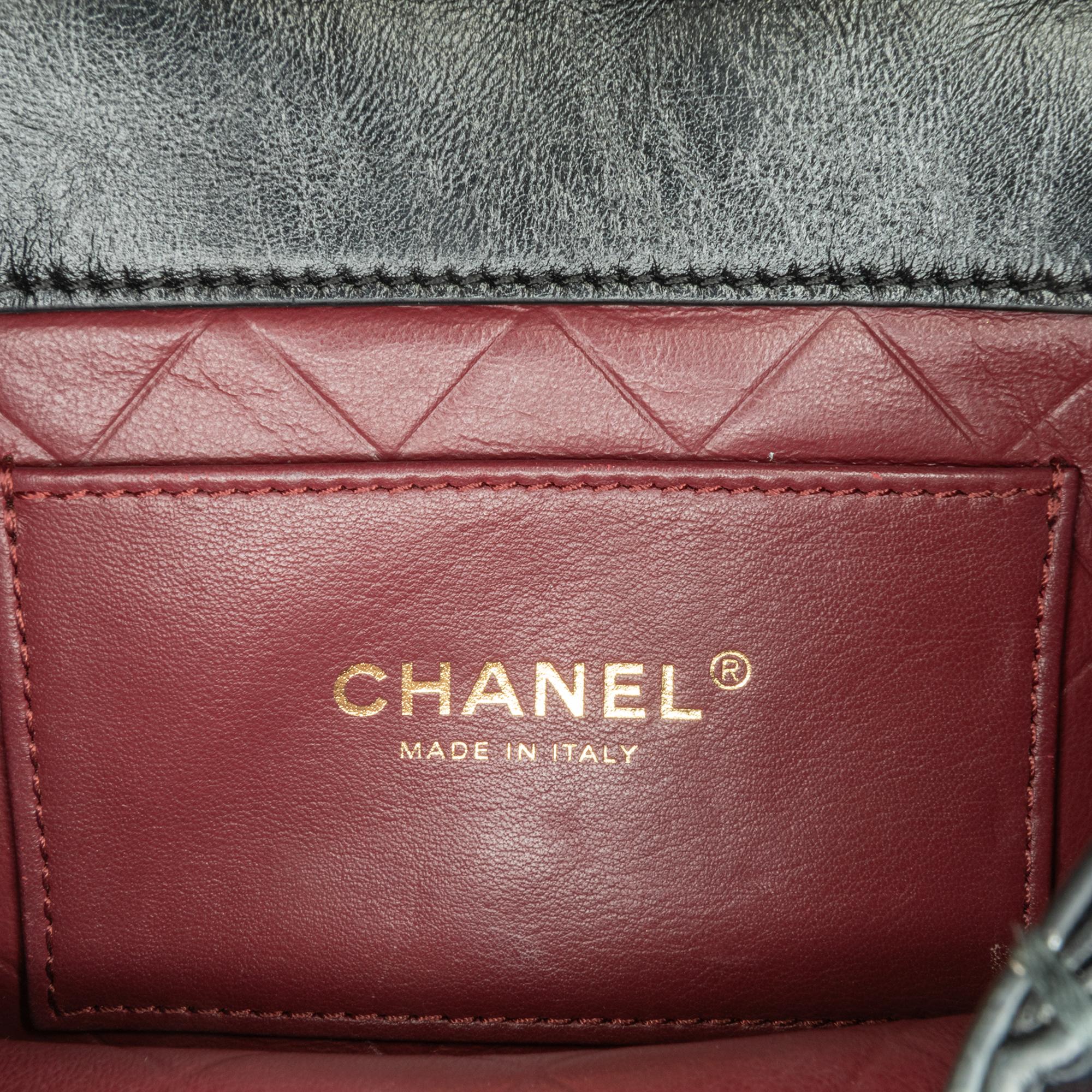 Chanel CC Quilted Calfskin Round Moon Messenger Flap