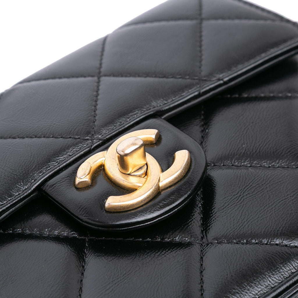 Chanel CC Quilted Calfskin Round Moon Messenger Flap