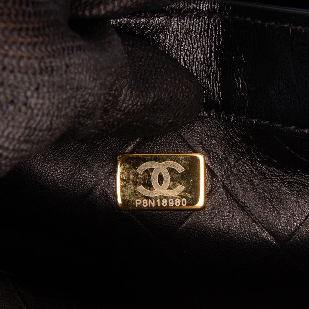 Chanel CC Quilted Calfskin Round Moon Messenger Flap