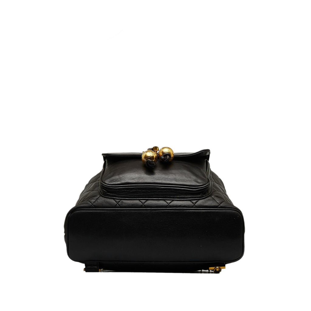 Chanel CC Quilted Lambskin Drawstring Backpack (SHG-86DOIB)