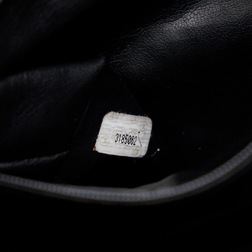 Chanel CC Quilted Lambskin Drawstring Backpack (SHG-86DOIB)