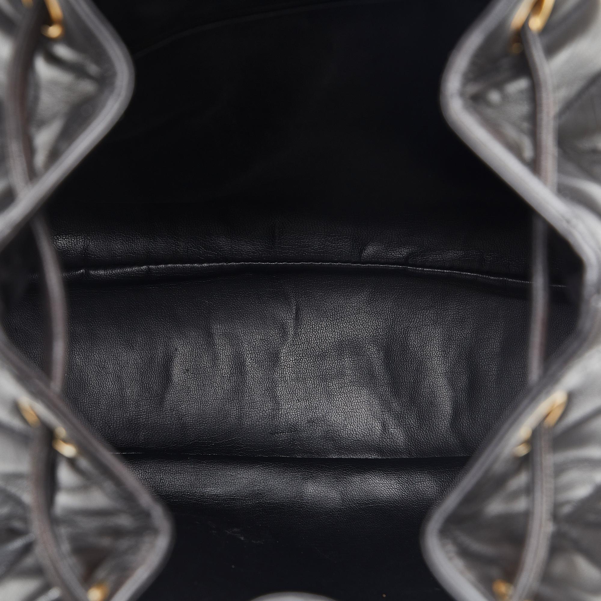 Chanel CC Quilted Lambskin Drawstring Backpack (SHG-86DOIB)