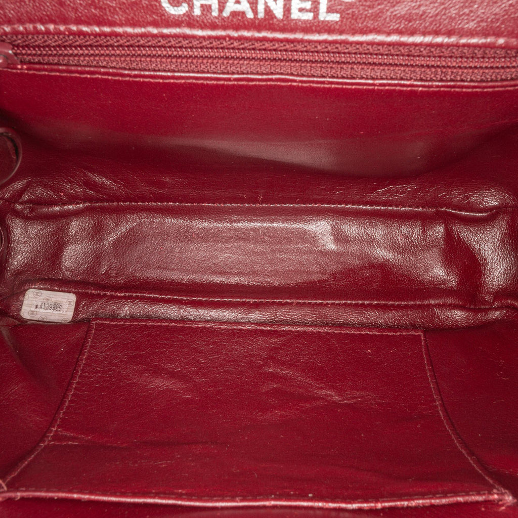 Chanel CC Quilted Lambskin Kiss Lock Frame Top Handle Bag